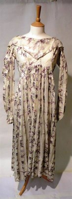 Lot 1178 - Circa 1840's Cotton Day Dress, printed with a purple and green sprigged design, with long...