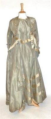 Lot 1179 - 19th Century Eau de Nil Silk Two Piece comprising a fitted jacket with cream silk trimmed...