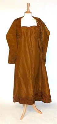 Lot 1180 - Early 19th Century Silk Dress in the Empire style, with a double ruched neckline, long sleeves,...