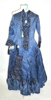 Lot 1181 - 19th Century Blue Satin Two Piece Suit, comprising a fitted jacket with velvet brocade cuffs...