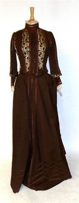 Lot 1183 - Circa 1870's Brown Silk Two Piece in a brown grosgrain silk with spot detailing, the fitted...