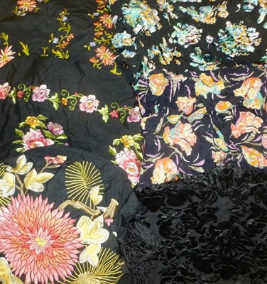 Lot 1187 - Four Assorted Black Silk Shawls, some with floral embroidery and Two Cut Velvet Devore Shawls (6)