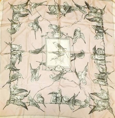 Lot 1194 - Hermes Silk Scarf 'Perruches', designed by Xavier de Poret depicting parrots on a soft pink...