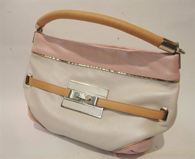 Lot 1201 - Tommy Hilfiger Handbag in a cream and pink opalescent leather with a light tan strap handle and...