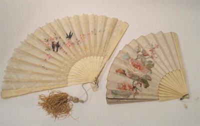 Lot 1207 - Early 20th Bone Fan with a painted silk mount decorated with flowers, with pierced and carved...