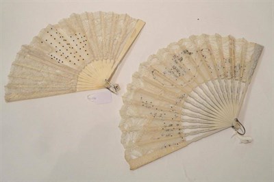 Lot 1209 - Early 20th Century Bone Fan, with lace and gauze mount appliqued with sequins, on carved and...