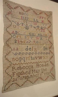 Lot 1241 - Framed Alphabet Sampler by Rebecca Hoade Age 9 Dated 1783,  worked in silk threads in cross stitch