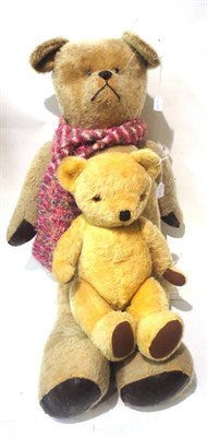Lot 1020 - Large Yellow Plush Jointed Teddy Bear 'Sammy' with stitched nose, glass eyes and leatherette...
