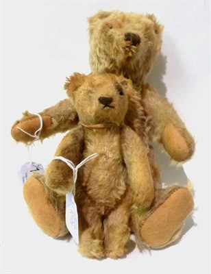 Lot 1021 - Small Steiff Yellow Plush Jointed Teddy Bear, with button to ear, vertical stitched nose, 14cm;...