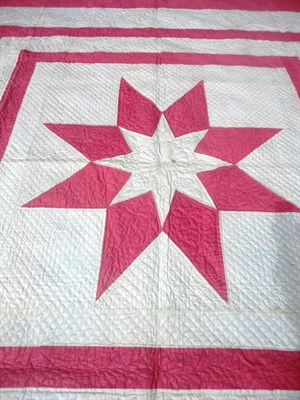 Lot 1028 - Late 19th Century Pink and White 'Star' Quilt, 240cm by 240cm