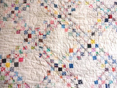 Lot 1031 - Patchwork Quilt comprising 1.5cm square coloured patches on a white ground, 215cm by 210cm