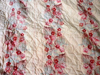 Lot 1035 - Floral Striped Quilt with pink to the reverse, 230cm by 245cm