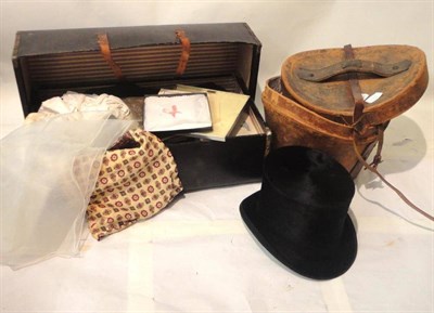 Lot 1147 - E Goodall Black Silk Top Hat, 20cm by 16cm in a fitted leather hat box; Edwardian Cream Silk...