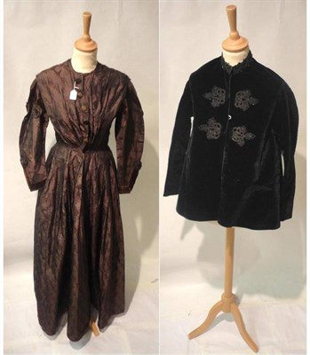 Lot 1180 - A Victorian Brown Silk Brocade Day Dress with velvet trims; Dark Navy Velvet Jacket with black...