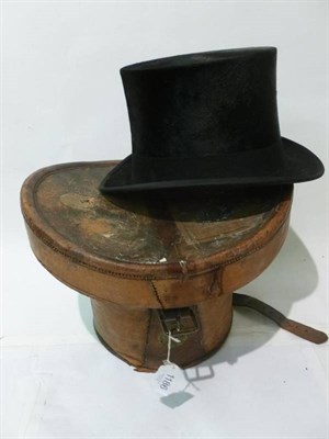 Lot 1186 - Superfine Black Silk Top Hat, in a fitted leather hat box with red velvet lining, 17cm by 21cm