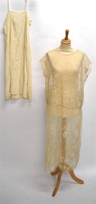 Lot 1237 - Cream Silk Shawl embroidered in pale coloured silk threads of foliate design; Circa 1920's Lace...