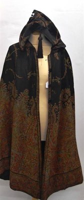 Lot 1238 - Late 19th Century Paisley Cape on a black ground, with attached hood