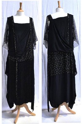 Lot 1244 - Circa 1920's Black Chiffon Drop Waist Dress with sheer lace flowing three quarter length...