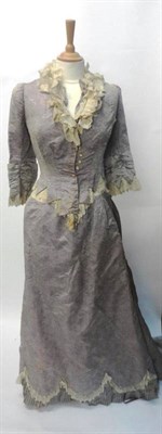 Lot 1248 - 19th Century Lilac Silk Three Piece Costume comprising a fitted jacket with buttons to the...