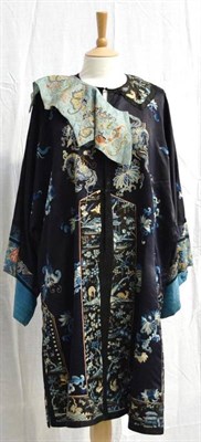 Lot 1256 - Early 20th Century Chinese Navy Blue Silk Jacket embroidered in blue and cream with floral...