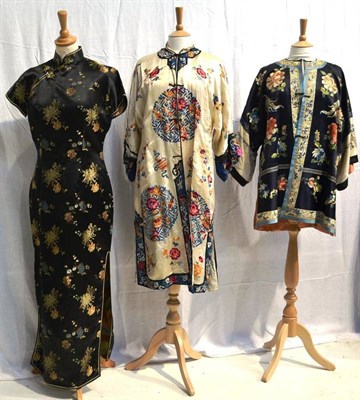 Lot 1257 - Early 20th Century Chinese Jacket, of navy blue silk with floral embroidery and appliqued...