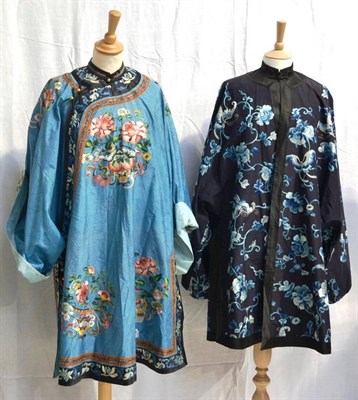 Lot 1258 - Chinese Navy Blue Silk Jacket embroidered with blue and cream silk flowers and butterflies...