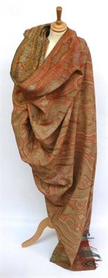 Lot 1025 - Red Ground Woven Wool Paisley Shawl, 180cm by 170cm