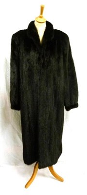 Lot 1113 - Astrakhan Three Quarter Length Cape; black velvet and cream lined theatrical cape; blue wool...