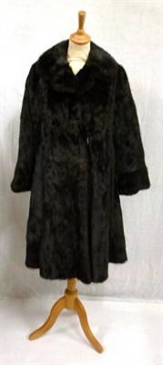 Lot 1114 - Circa 1960's Mono London Black Wool Coat with fur trimmed collar; fox fur stole, fur jacket and...