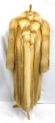 Lot 1128 - A Three Quarter Length Fox Fur Coat