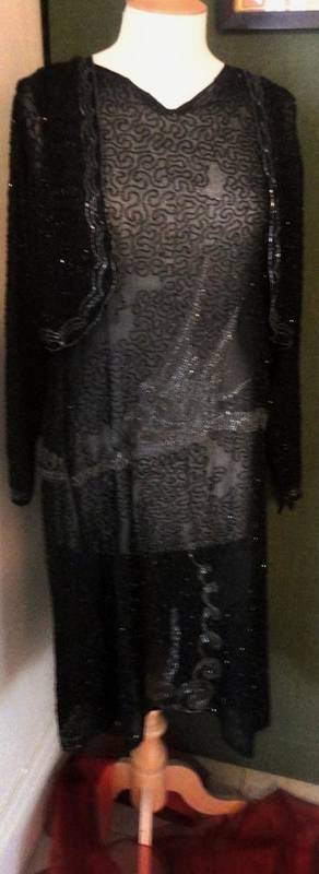 Lot 1146 - Circa 1920's Black Chiffon Sleeveless Shift Dress with black and clear beaded decoration; and a...