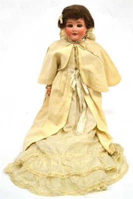 Lot 1004 - Large Schoenau and Hoffmeister Bisque Socket Head Doll impressed '914' '11' with sleeping blue...