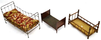 Lot 1013 - Iron Dolls Cot with cushion mattress, 72cm by 29cm by 40cm; Apprentice Made Mahogany Inlaid Bed...