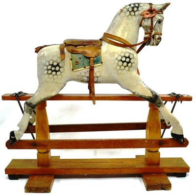 Lot 1018 - A Small Dapple Grey Rocking Horse stamped 'Made By Crown Products, Ossett, Yorks', with a...