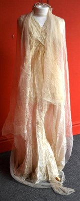 Lot 1133 - Circa 1930's Bias Cut Wedding Dress with lace dress embroidered with large flower heads, cream...