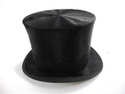 Lot 1152 - Alfred Lee Kirkgate Bradford Black Silk Top Hat in a hat box, 15.5cm by 19.5cm; Hillgate & Co...