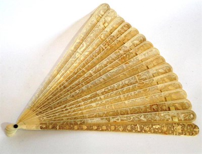 Lot 1157 - Late 19th Century Carved Ivory Fan with pierced sticks carved with three cartouches of oriental...