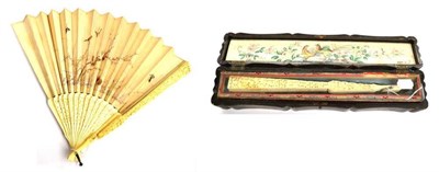 Lot 1172 - A 19th Century Chinese Ivory Fan with embroidered silk mount, carved guards and pierced sticks...