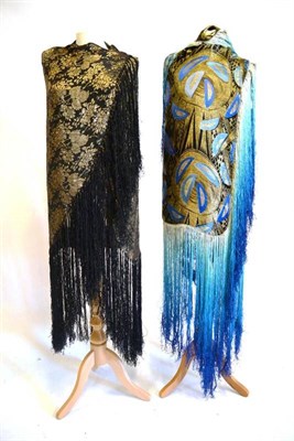 Lot 1186 - Art Deco Style Woven Shawl with blue and gold decoration and a tassel trim, 80cm by 120cm...