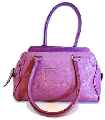 Lot 1189 - Tod's Purple/Lilac Textured Leather Handbag with pockets to each side, zip top, two shoulder...