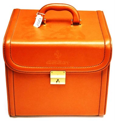 Lot 1207 - Ferrari Tan Leather '456GT' Vanity Case with brass mounts, carrying handle, with keys, as new, 32cm