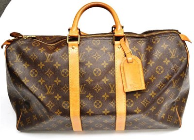 Lot 1210 - Louis Vuitton Canvas Logo Printed Keepall 45 Holdall, with tan leather straps and handles and...