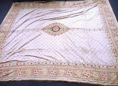 Lot 1212 - Early 20th Large Indian Style Cream Silk Bed Cover embroidered in gilt, pink and blue silk...