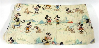 Lot 2031 - A Childs Quilt printed with Mickey and Minnie Mouse, Pluto and Clarabelle Cow, 145cm by 135cm