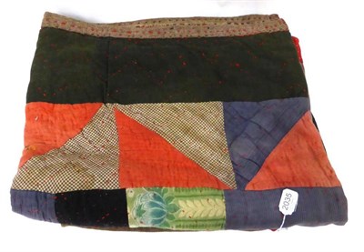 Lot 2035 - Late 19th Century Fisherman's Bunk or Settle Patchwork Quilt using wools and suiting fabrics,...