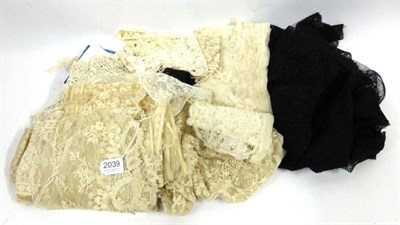 Lot 2039 - Assorted 19th Century and Later Machine and Hand Worked Lace including a black triangular...