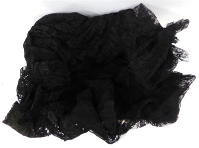 Lot 2043 - Late 19th Century Black Lace Capelet, black lace shawl, three flounces and edgings of floral...