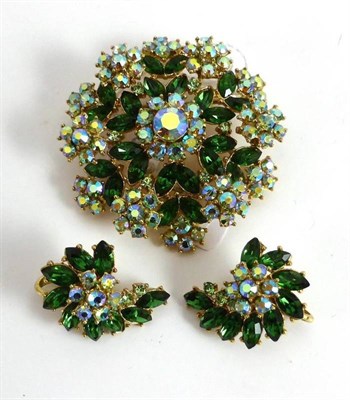 Lot 2069 - A Brooch and Earring Set, by Trifari, set with paste stones in green hues, brooch measures 5.4cm in