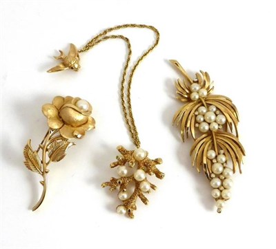 Lot 2070 - Three Simulated Pearl Brooches, by Trifari, one in a leaf and berry form, measures 3.5cm by...