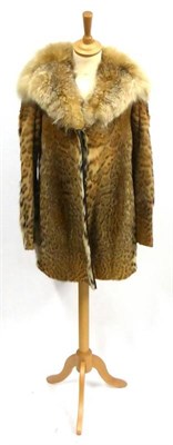 Lot 2114 - Ocelot Jacket with fox trimmed collar and leather trims to the front  With CITES A10...